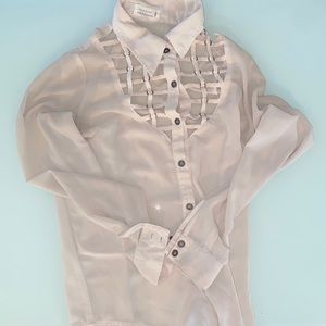 Unique and detailed blouse.